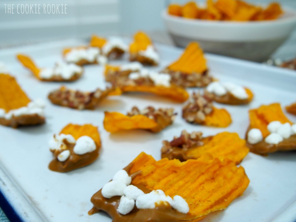 sweet potato chips dipped in cinnamon white chocolate and topped with marshmallows and pecans! my favorite side dish in snack form! loaded sweet potato chips!