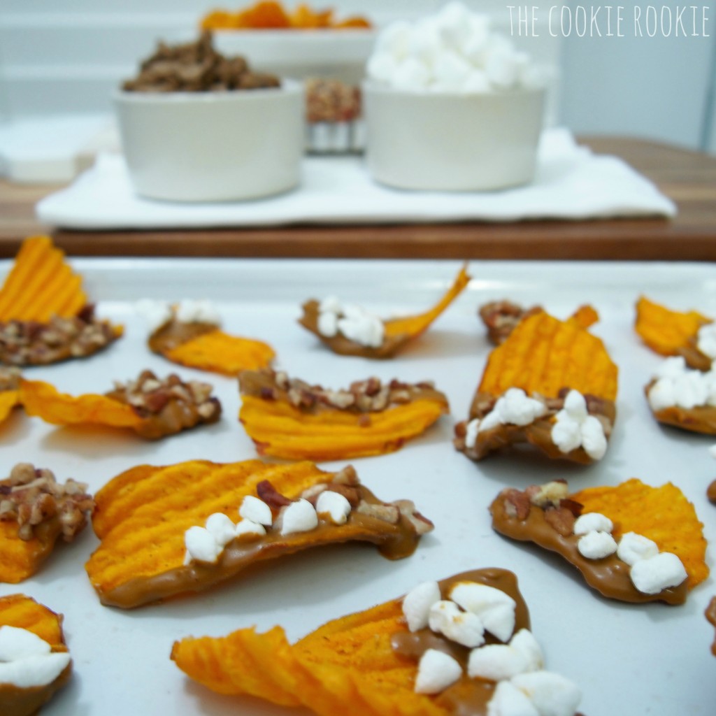 sweet potato chips dipped in cinnamon white chocolate and topped with marshmallows and pecans! my favorite side dish in snack form! loaded sweet potato chips!