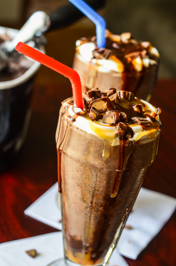 Boozy Caramel Peanut Butter Cup Milkshakes | Chocolate, caramel, peanut butter overload! Get the recipe on MyCookingSpot.com!