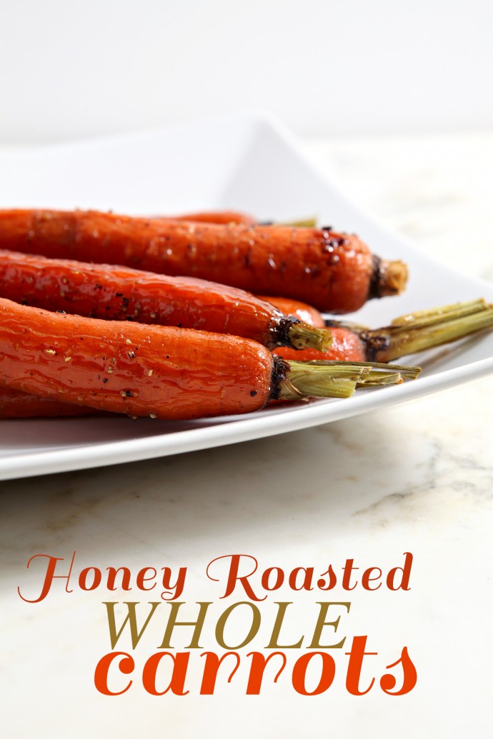 Honey Roasted Whole Carrots are the perfect accompaniment for any weeknight meal. Carrots are tossed in olive oil and honey, then dusted with cayenne pepper for a delightful sweet-spicy kick. #sidedish #carrots #cayenne #weeknightside