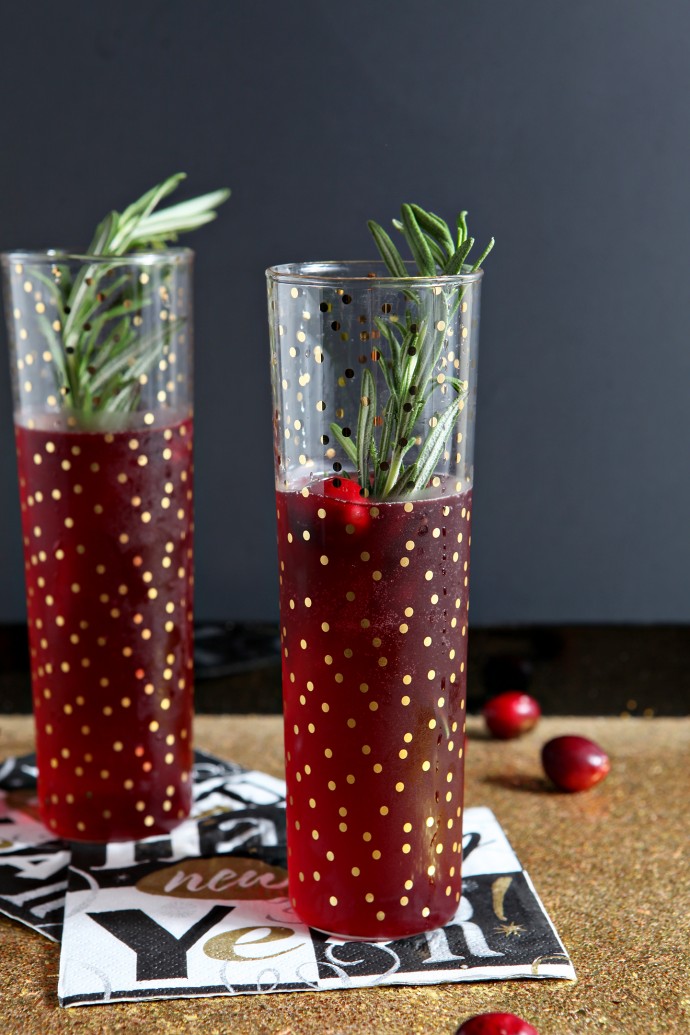 Ring in the new year by making these seasonal Cranberry Bellinis! Unsweetened cranberry juice is combined with simple syrup and prosecco to make these create these festive cocktails that are perfect for New Year's Eve!