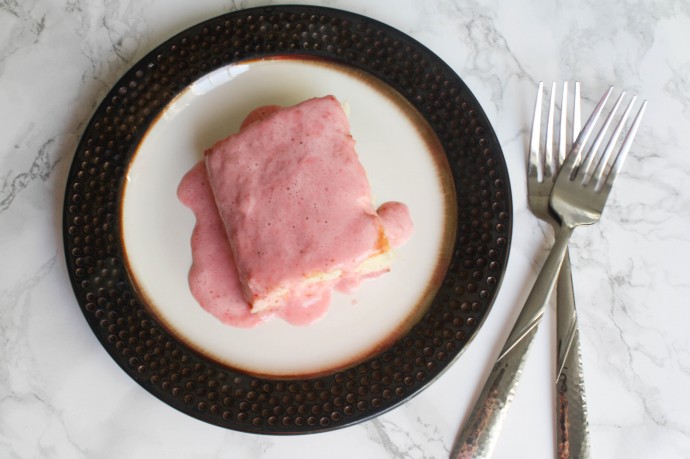 This pretty Strawberry Cream Cheese Poke Cake is a simple Spring dessert. Perfect for Easter or just because!