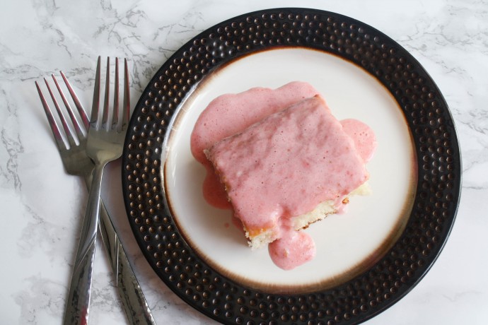 This pretty Strawberry Cream Cheese Poke Cake is a simple Spring dessert. Perfect for Easter or just because!